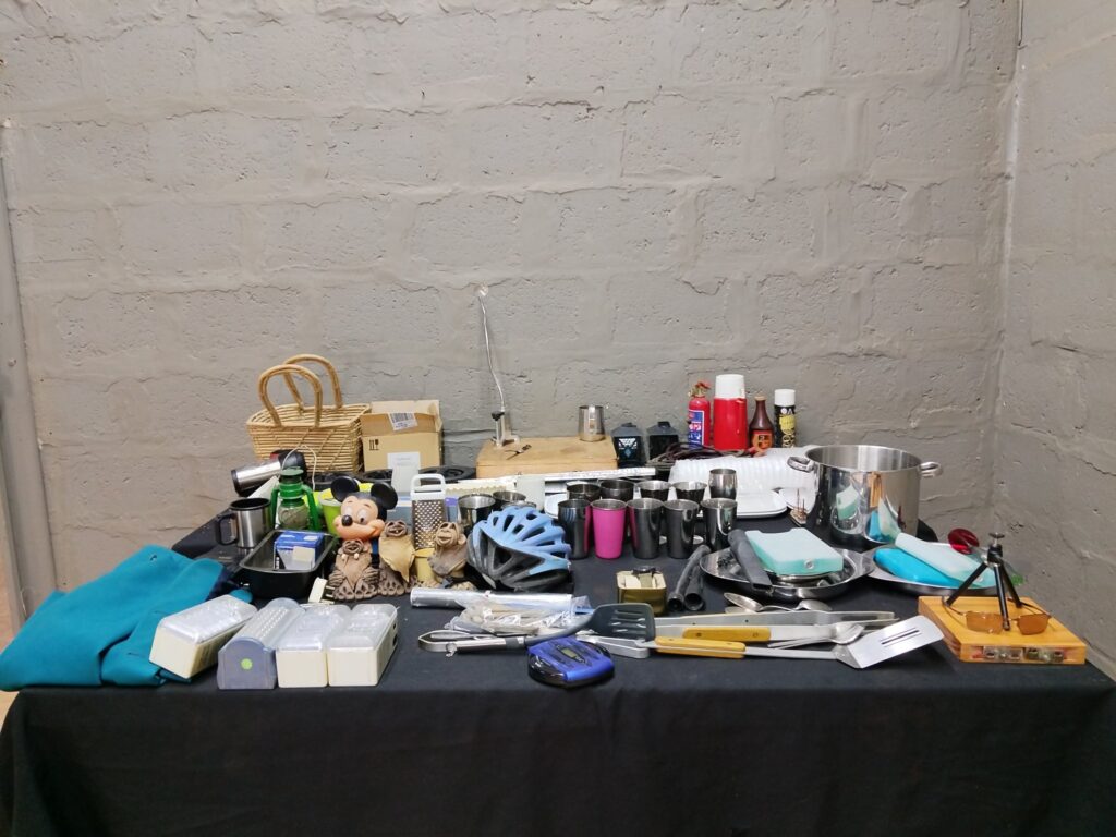 Mixed household & kitchenware lot — 43pcs inc. Fossil watch, stainless cups, stock pot, helmet & small electronics (declared NOT working)