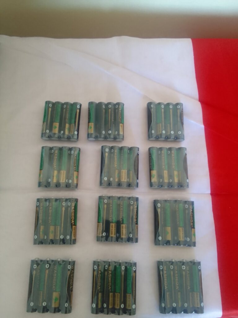Lot of 12 x 4‑cell AAA battery packs (48 AAA cells) – sealed, WASHIDA visible