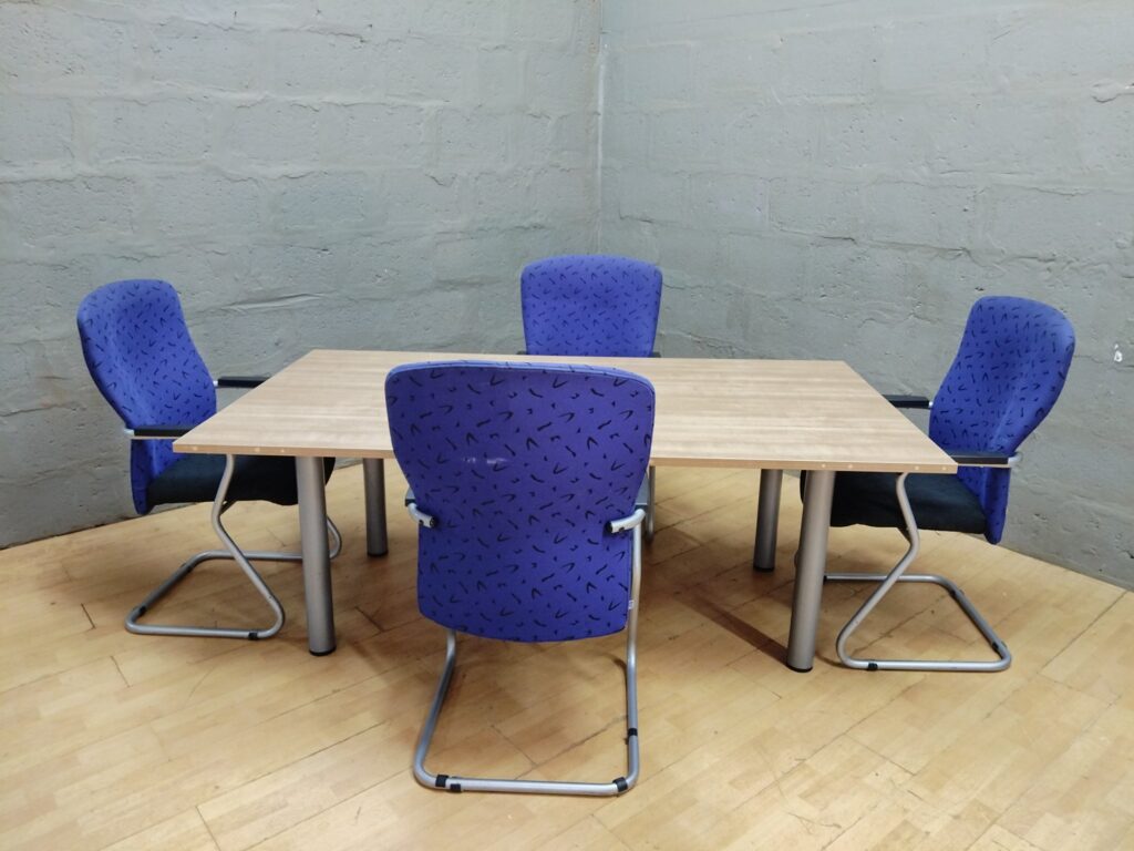 Office meeting table + 4 blue sled‑base visitor chairs — 194 x 108 x 72 cm table