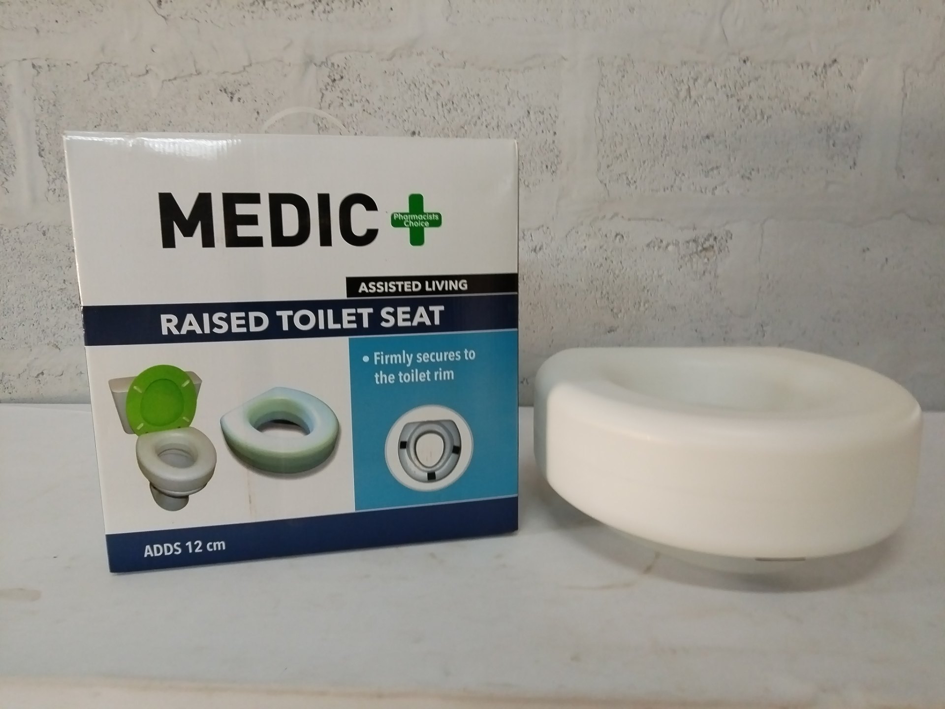 MEDIC Raised Toilet Seat — Adds 12 cm, boxed; light yellowing, no fasteners