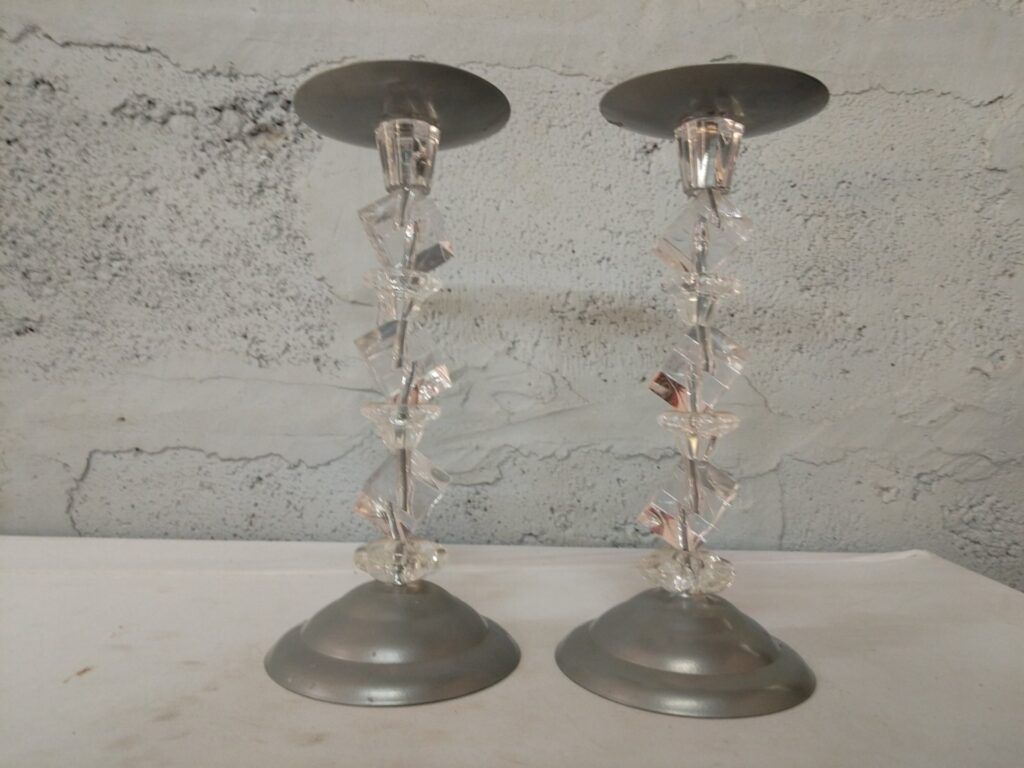 Pair of decorative stacked acrylic candlestick holders with metal bases — pair, top spikes present