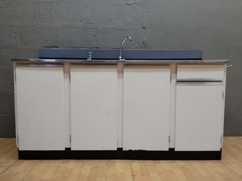 Freestanding kitchen sink unit — stainless double bowl top with cabinet base (180 × 55 × 108 cm)