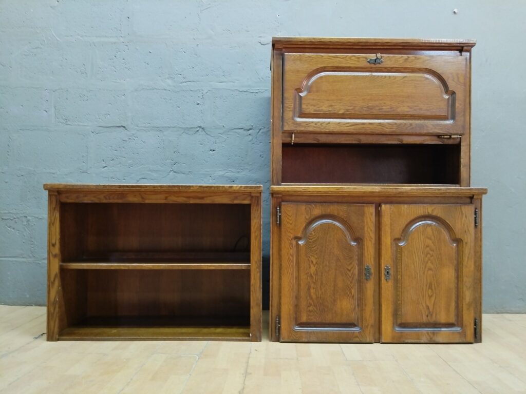 Two-piece oak display cabinet / bookcase with mirrored back, glass shelves & drop-front