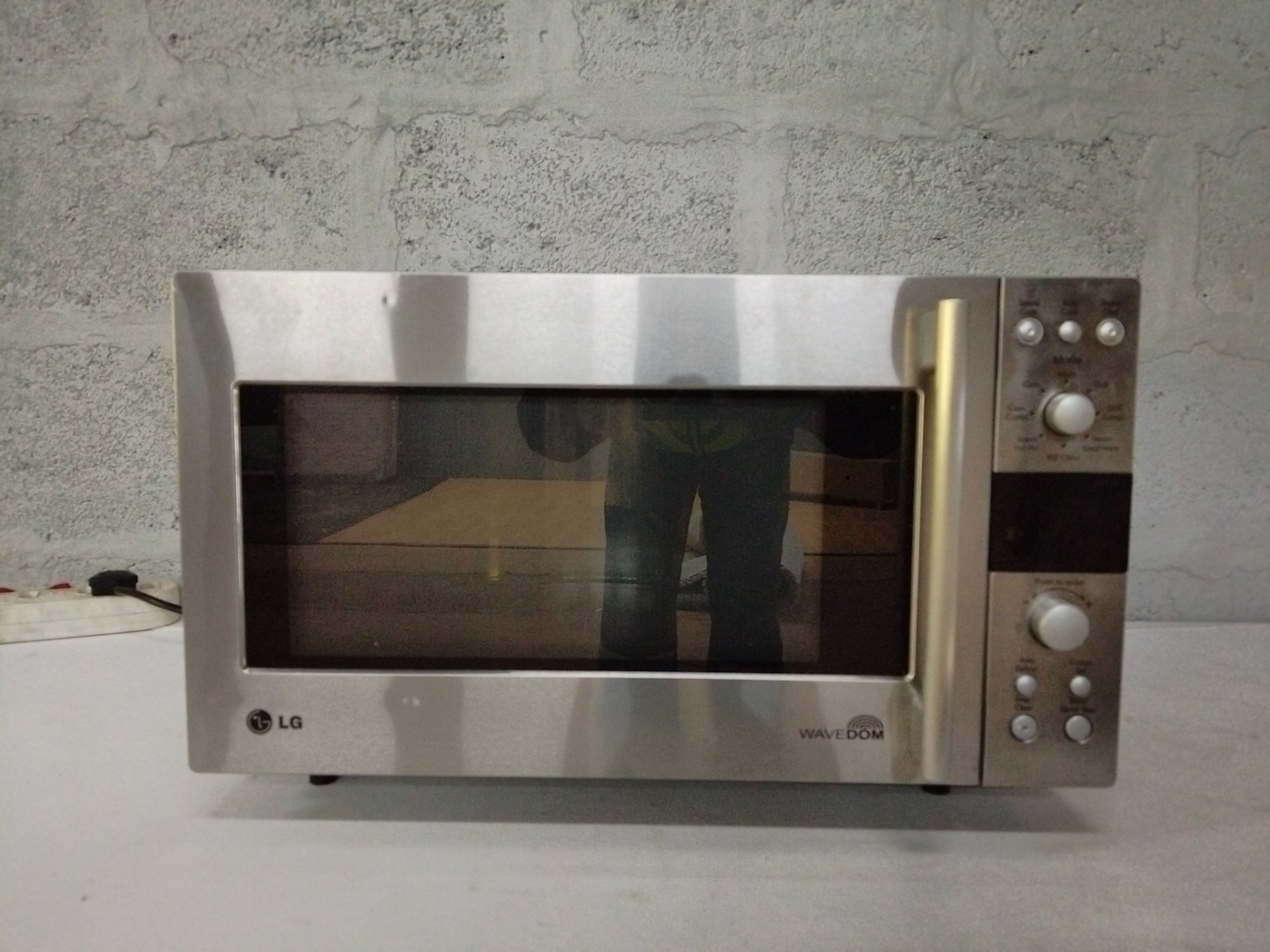 LG Wavedom stainless countertop microwave oven MC-8483NLR — working, used with wear
