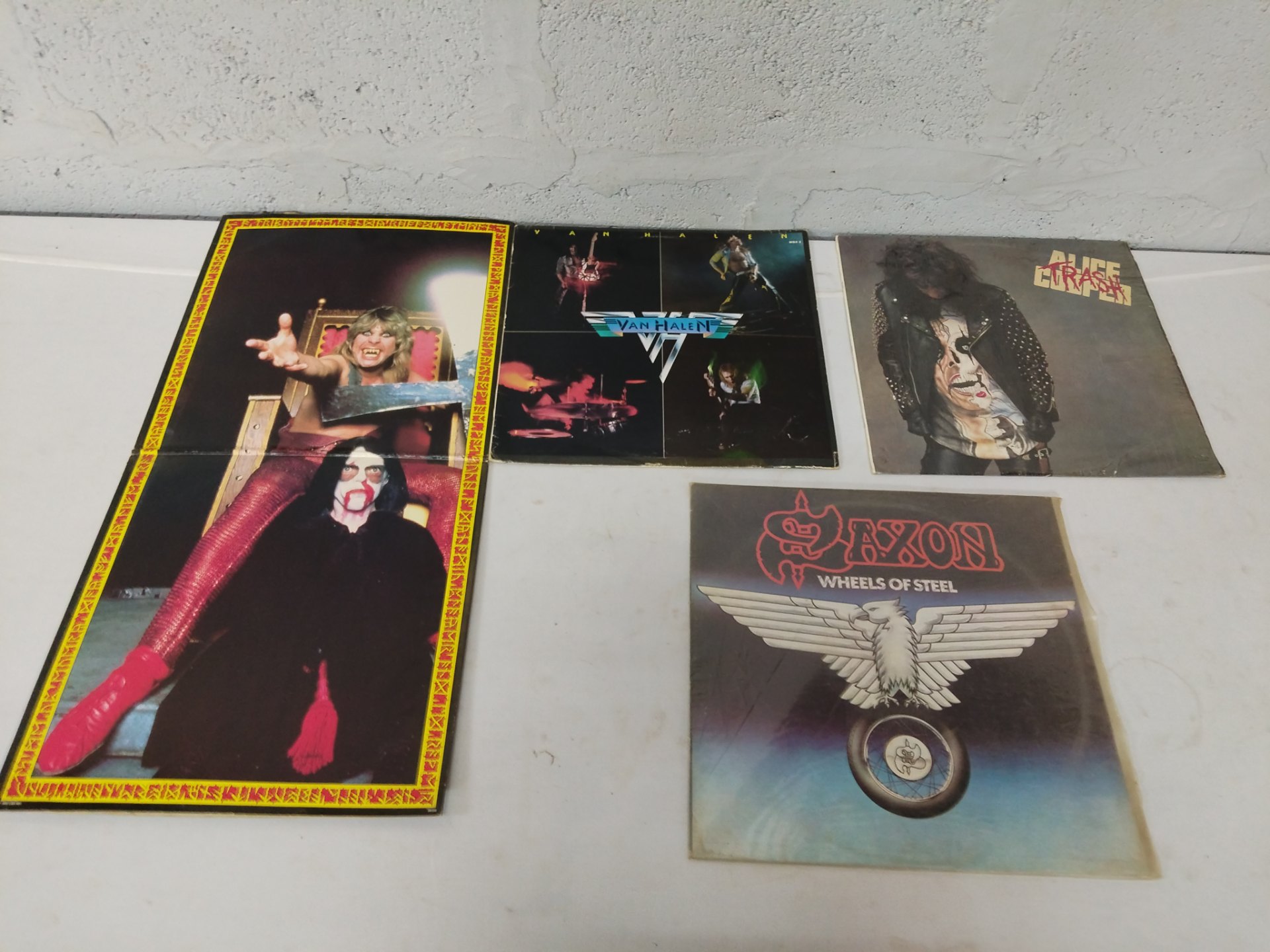 Mixed lot: 4 vintage rock LPs – Ozzy Speak of the Devil, Van Halen, Alice Cooper (shrinkwrapped), Saxon Wheels of Steel