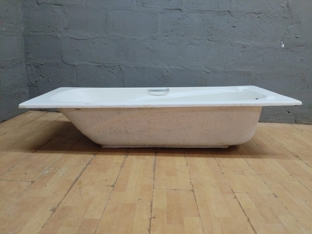 Used freestanding inset acrylic/fibreglass bathtub with chrome grab handle, waste & overflow — 170 × 69 × 39 cm