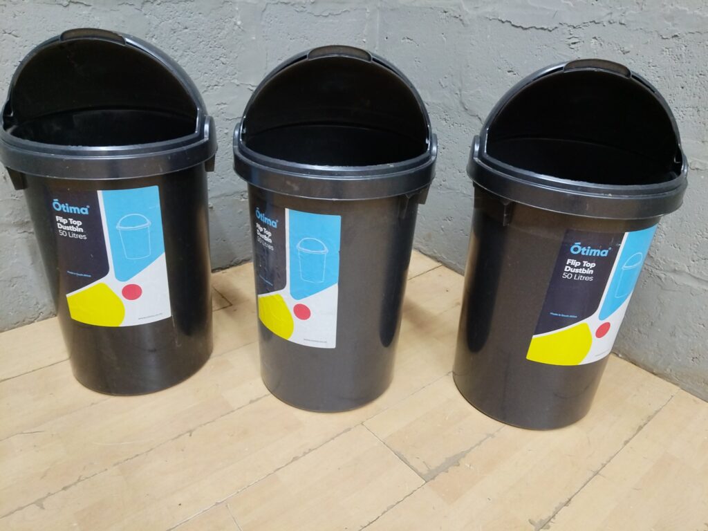 Lot of 3 Ōtima 50 L Flip-Top Dustbins — black, lids present, used