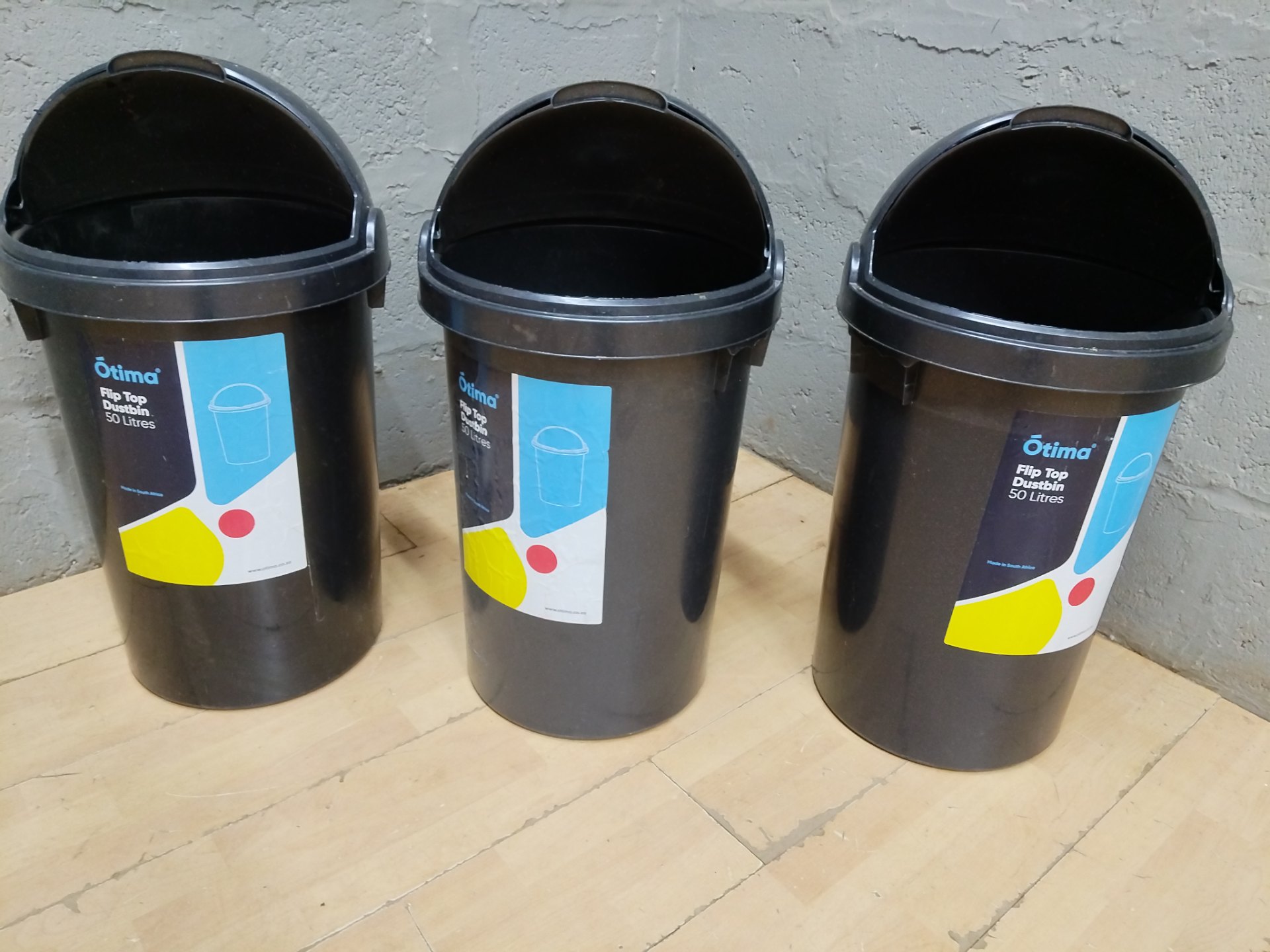 Lot of 3 Ōtima 50 L Flip-Top Dustbins — black, lids present, used