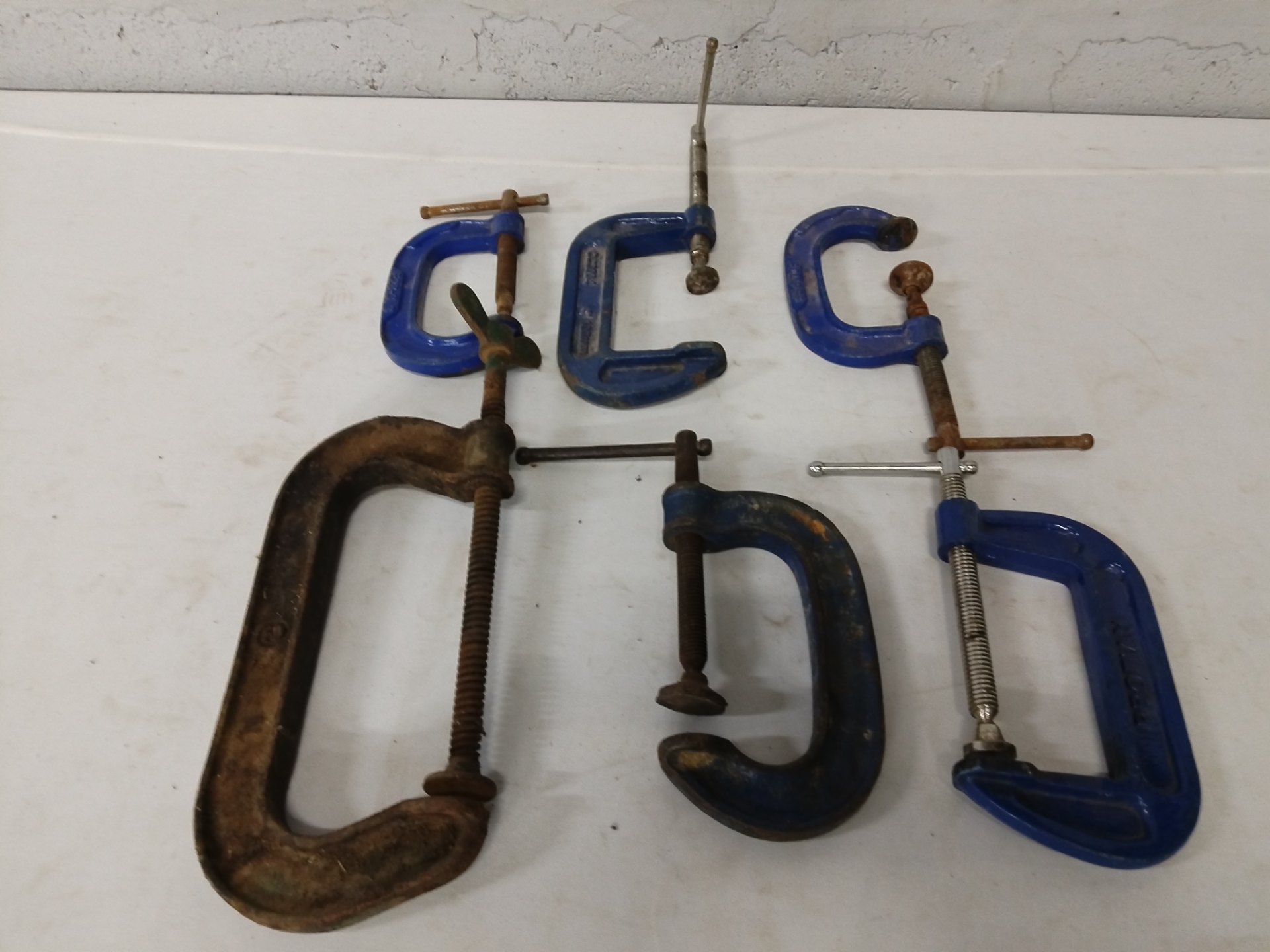 Lot of 6 assorted C‑clamps / G‑clamps – various sizes, used with surface rust; screws tested to turn