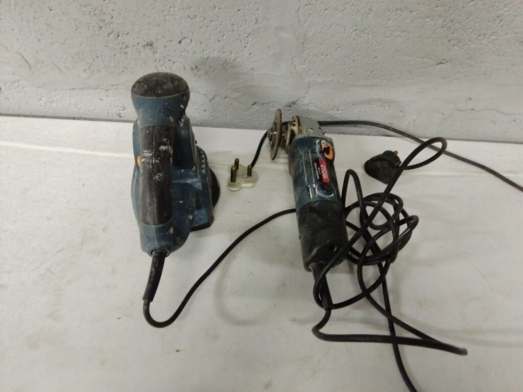Pair of Ryobi corded tools – Random Sander RS-250 + Ryobi Angle Grinder (HG-9.0 / HG-610) — well-used, working