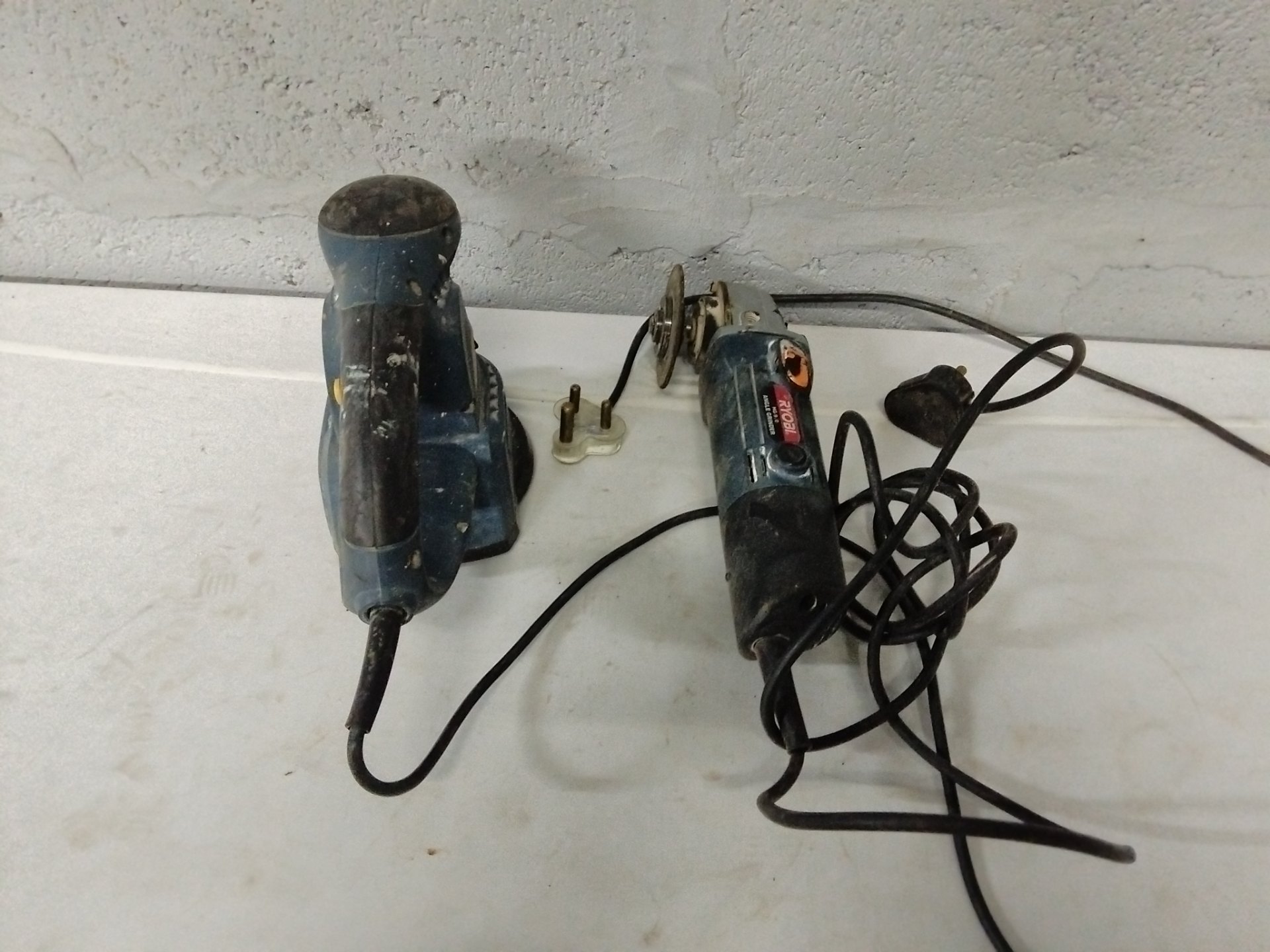 Pair of Ryobi corded tools – Random Sander RS-250 + Ryobi Angle Grinder (HG-9.0 / HG-610) — well-used, working