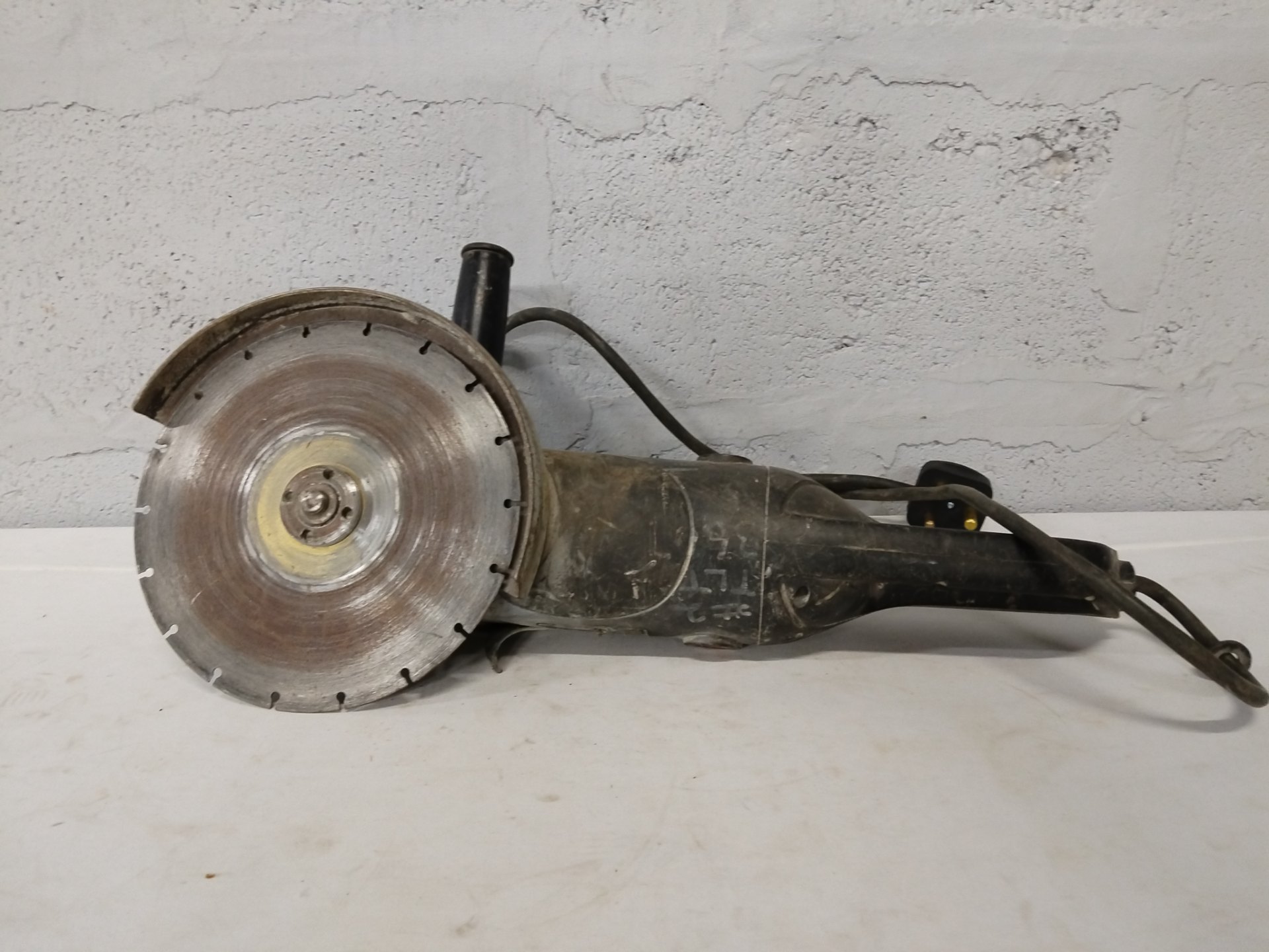 SKIL 2000W Corded Cut-Off Saw / Angle Grinder (model 9780) — run-tested, heavy cosmetic wear