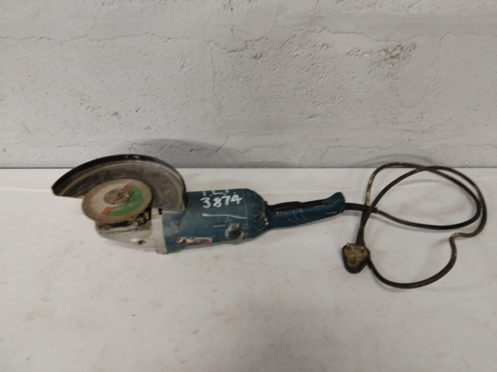Ryobi large hand-held angle grinder — used, heavy wear, NOT WORKING (spare/repair)