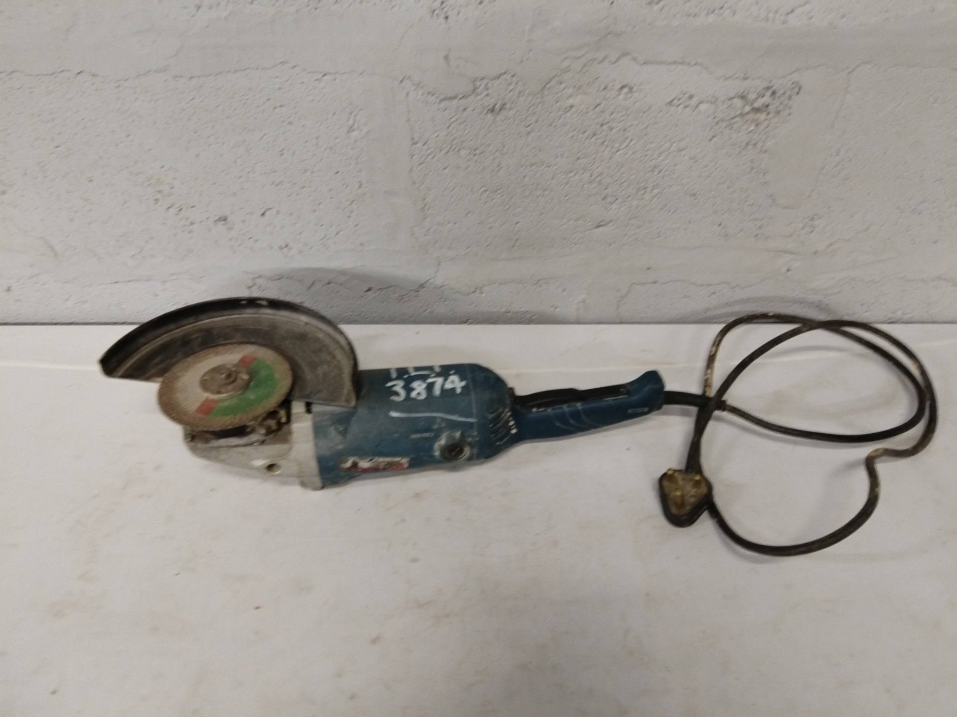 Ryobi large hand-held angle grinder — used, heavy wear, NOT WORKING (spare/repair)