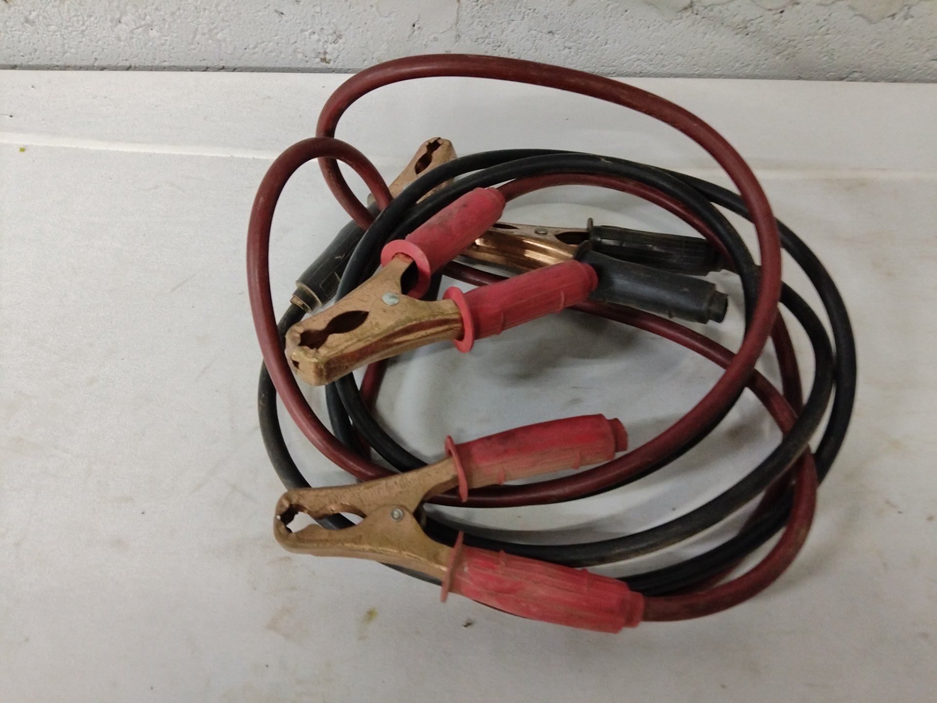 Used Jumper/Booster Cable Set — Red & Black, Insulated Clamps, Surface Corrosion