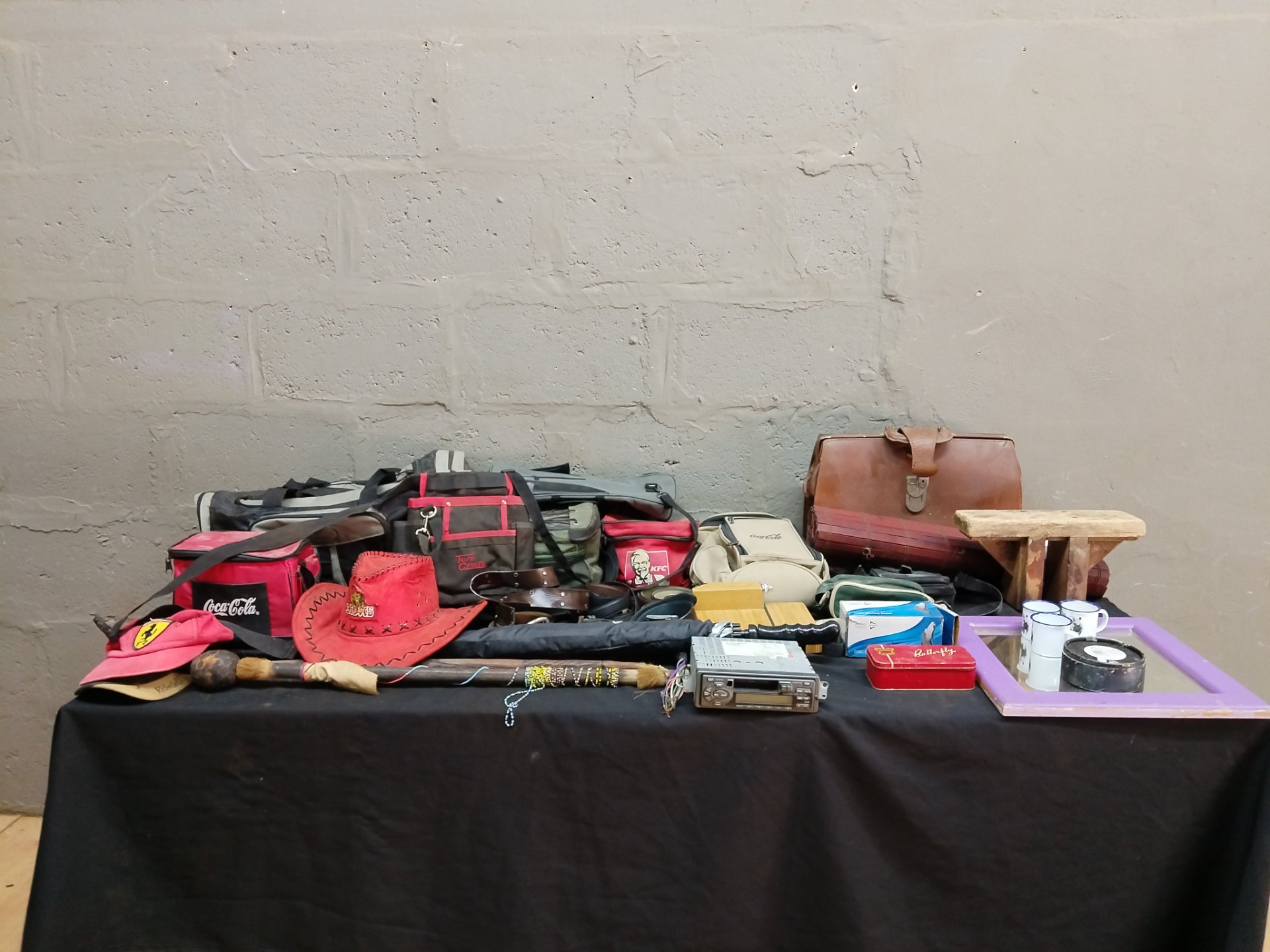 Mixed lot — 15 used bags, hats, belts, walking sticks, wooden stool, tins, mirror + car stereo (not working)