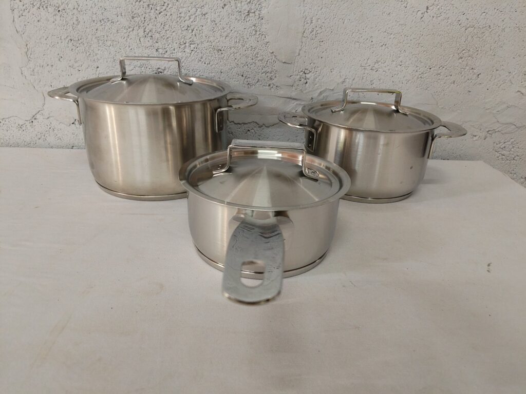 Iittala (as pictured) stainless-steel 3-pot cookware set with lids — used, good condition