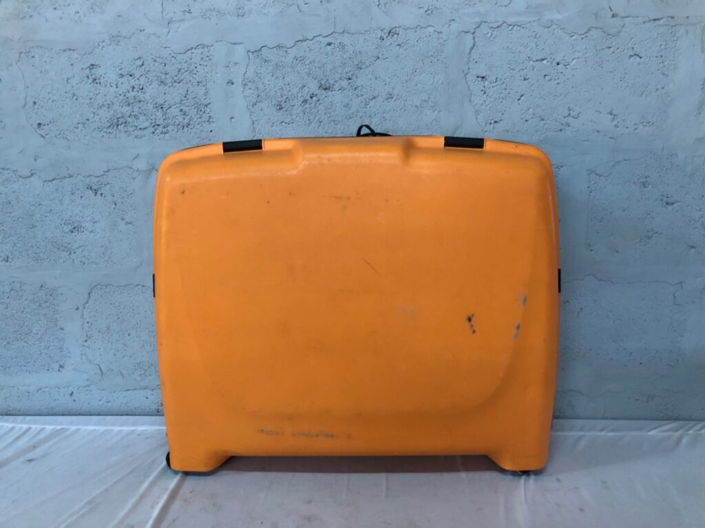 Lojel II orange hard-shell rolling suitcase — wheels roll, telescopic handle ok, torn seam & lock not working