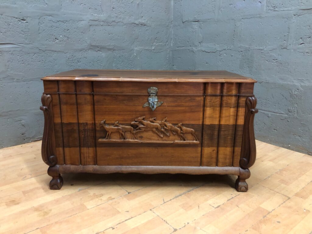 Carved Wooden Blanket Chest / Storage Trunk with Running-Animal Panel and Brass Hasp