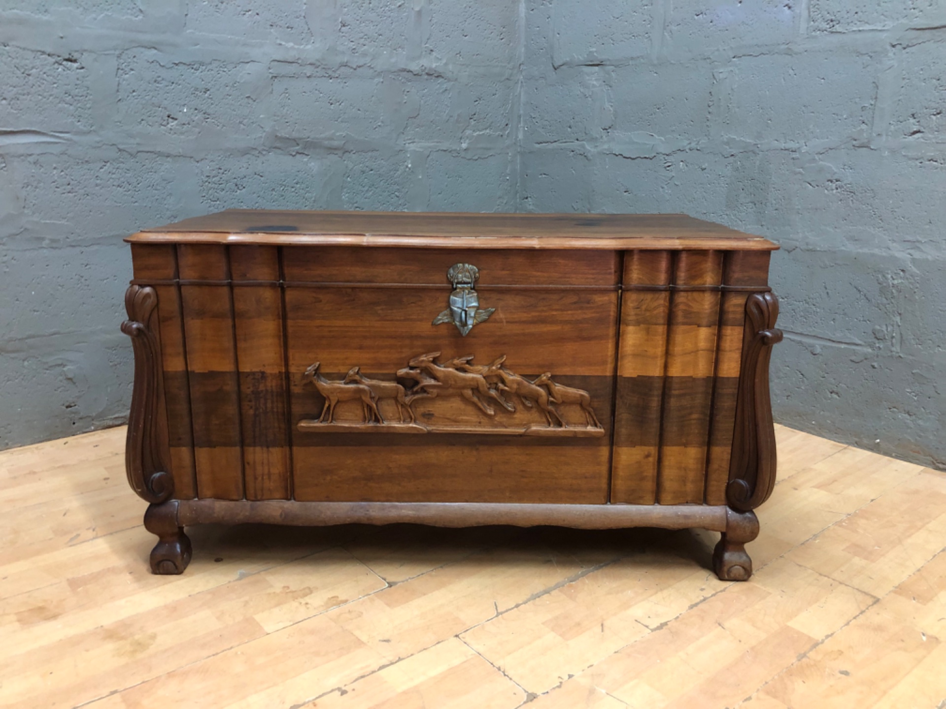 Carved Wooden Blanket Chest / Storage Trunk with Running-Animal Panel and Brass Hasp