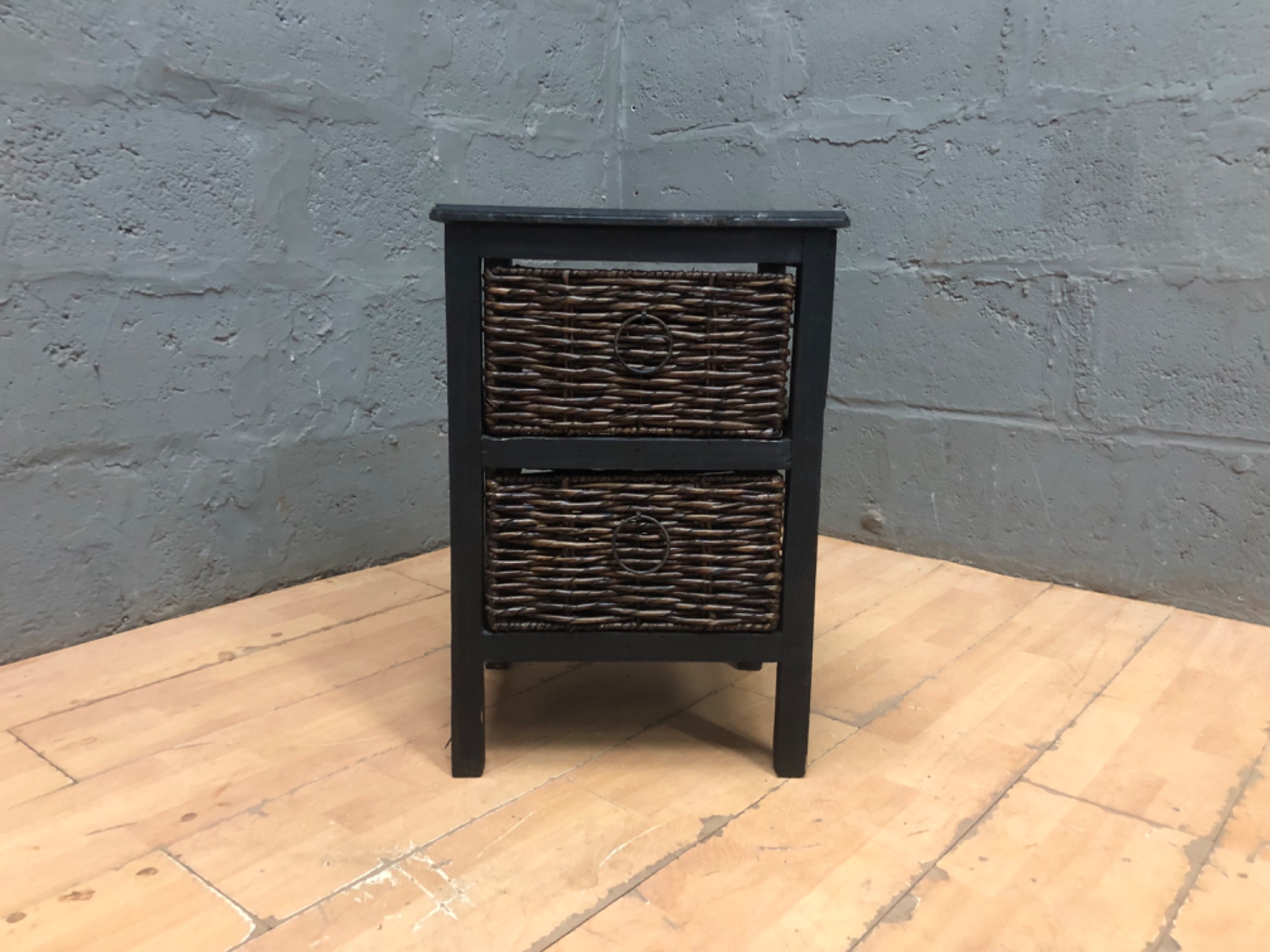 Compact black wooden bedside / side table with two woven wicker drawers