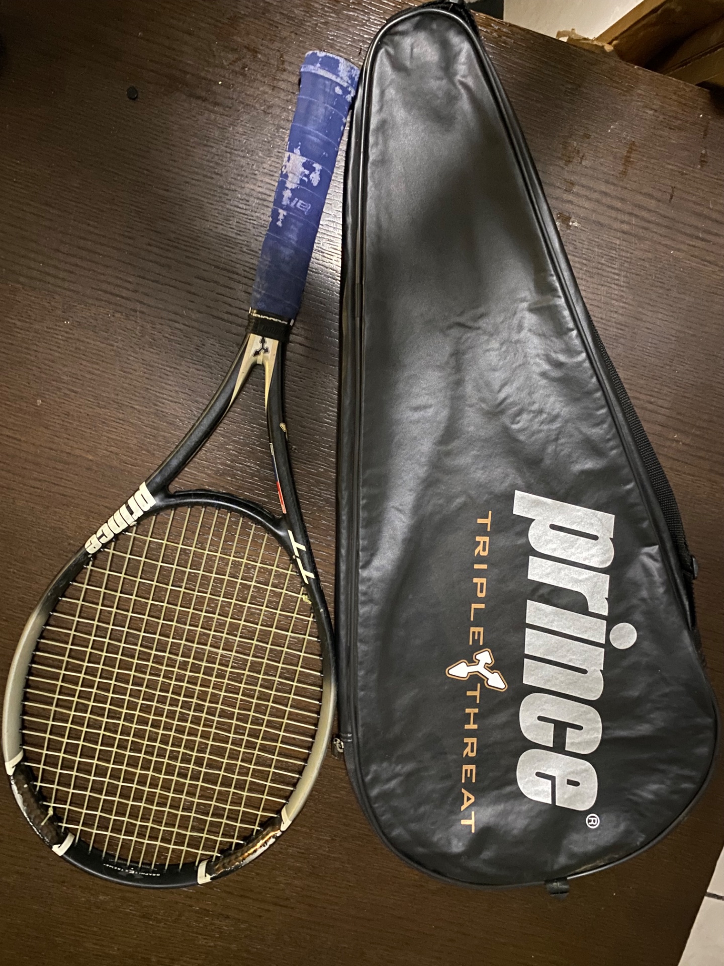 Pair of Prince Triple Threat “Deliverance” tennis rackets (x2) — strung & playable, grips worn, with zipped covers