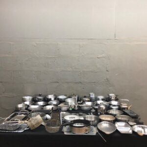 Mixed lot — 74 assorted metal cookware & kitchen accessories (pots, pans, trays, colanders, baskets, lids)