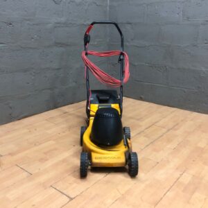 Mini-Vac corded electric lawn mower — working, grass collector attached, heavy cosmetic wear