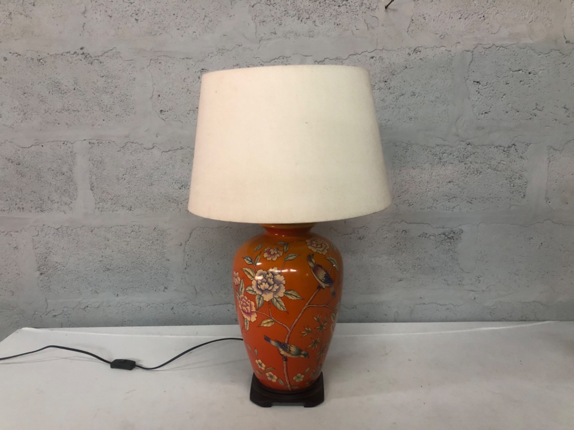Decorative orange ceramic table lamp with floral & bird motif, fabric shade, wooden stand — 75 cm, working