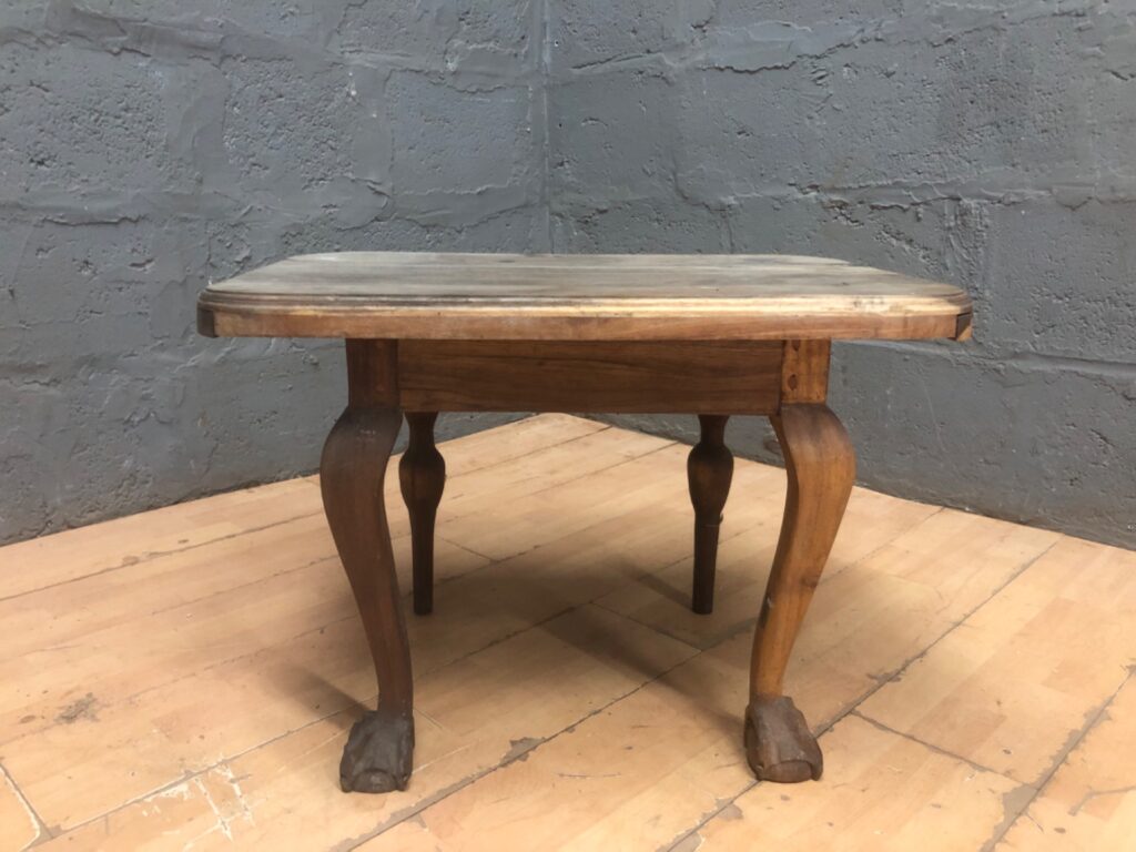 Small wooden occasional/coffee table with cabriole legs & claw feet — worn top, needs restoration