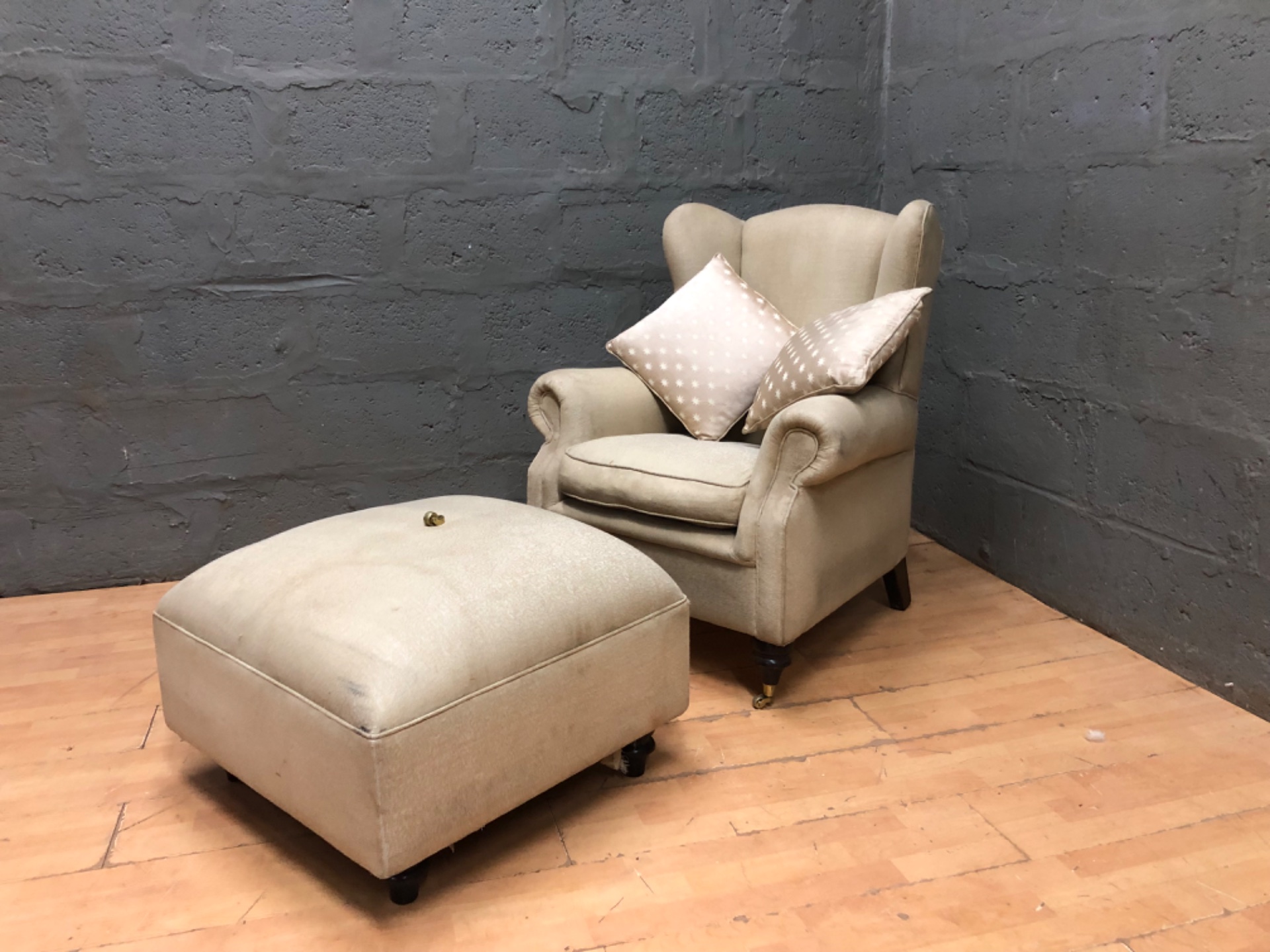 Beige Upholstered Wingback Armchair with Matching Ottoman — Scroll Arms, Brass Castors (Ottoman Foot Loose)