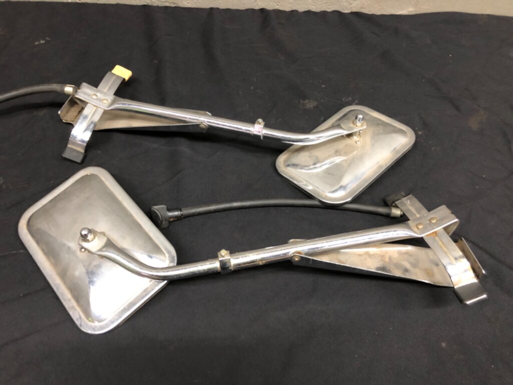 Pair of adjustable clamp-on chrome vehicle side mirrors — used, fair condition