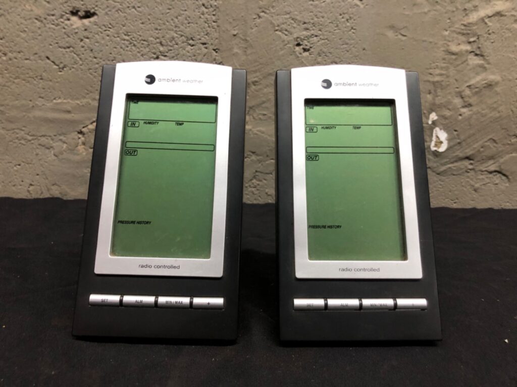 Pair of Ambient Weather radio-controlled digital display units — used, batteries installed, battery-well corrosion