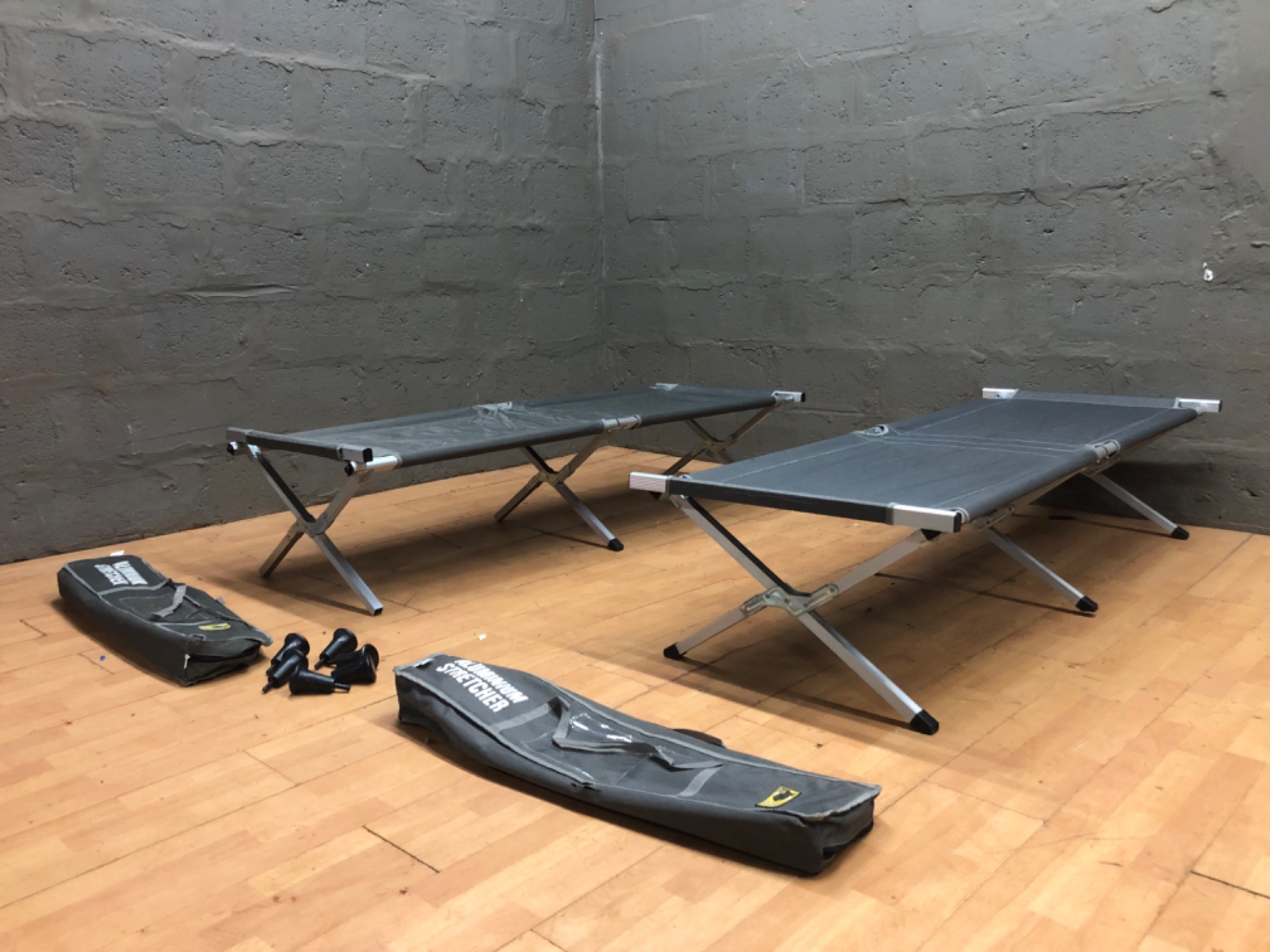 Pair of Bush Baby Aluminium Folding Stretchers / Camping Cots with Carry Bags & Spare Feet