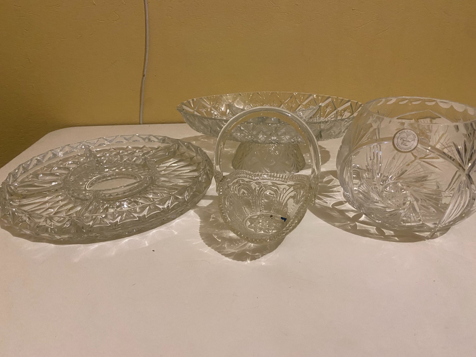 Assorted cut‑style glassware / pressed crystal lot with Renaissance Collection flute box (divided plate, handled basket, pedestal bowl, round bowl)