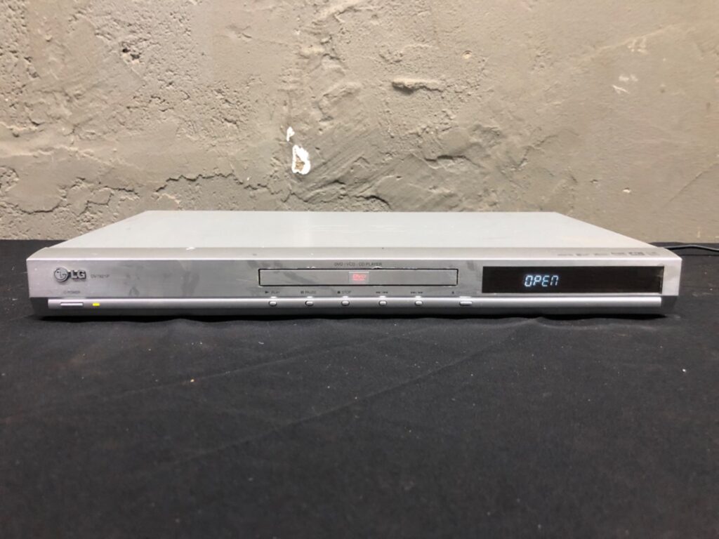 LG DV7821P Silver DVD / VCD / CD Player — Powers On (Display shows OPEN) — Used, Cosmetic Wear