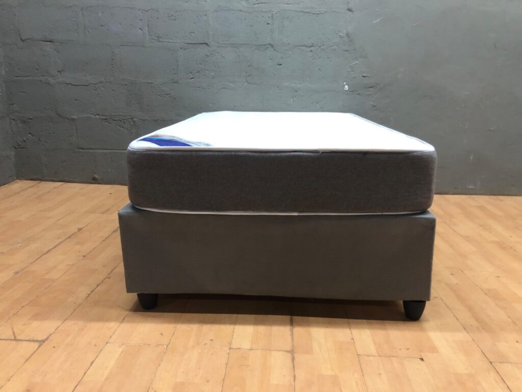 3‑Quarter Bed — Single mattress on fabric divan base (108 x 188 x 61 cm) with 150+kg rating