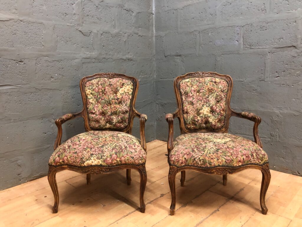 Pair of carved wooden tapestry armchairs — floral upholstery, carved frames