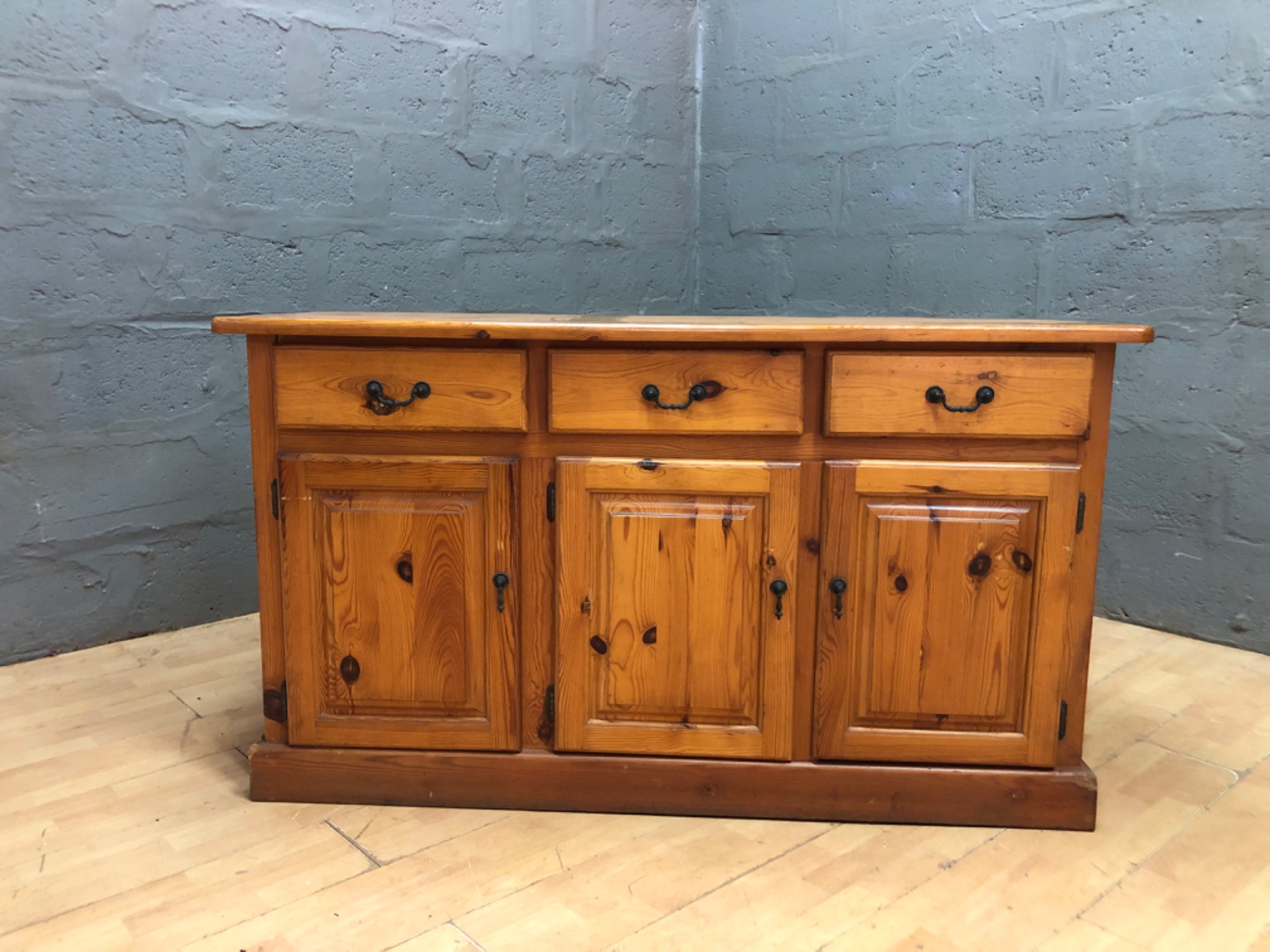 Solid pine 3-drawer 3-door sideboard / buffet — original metal handles, good used condition