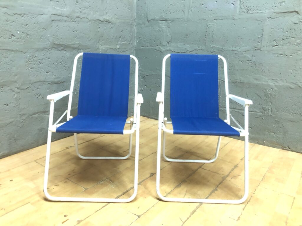 Pair of blue sling outdoor / beach chairs — white tubular frames, matching pair