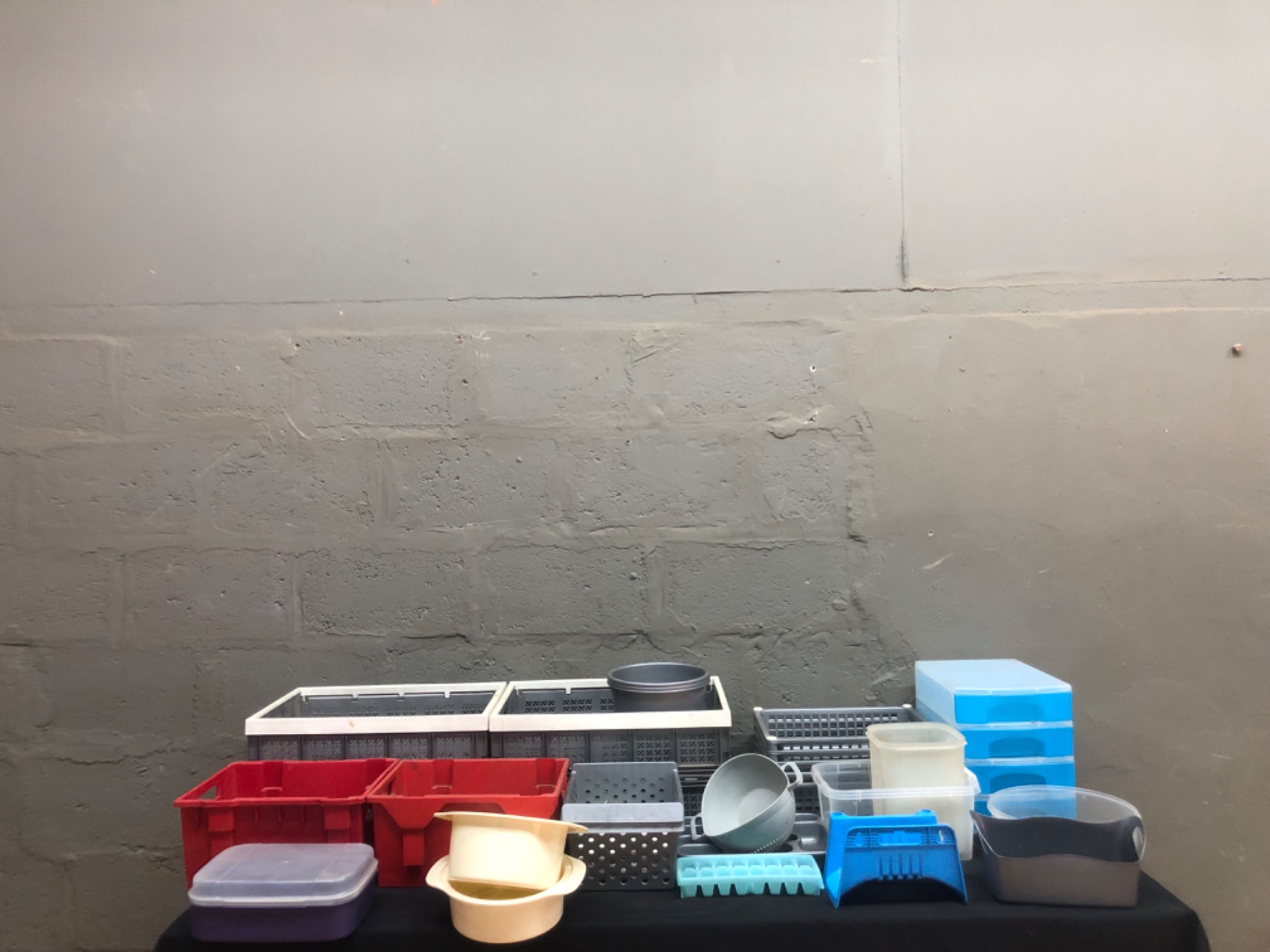 Mixed lot: Assorted plastic storage crates, trays, tubs + 21 used golf balls — 16 items (fair, needs cleaning)