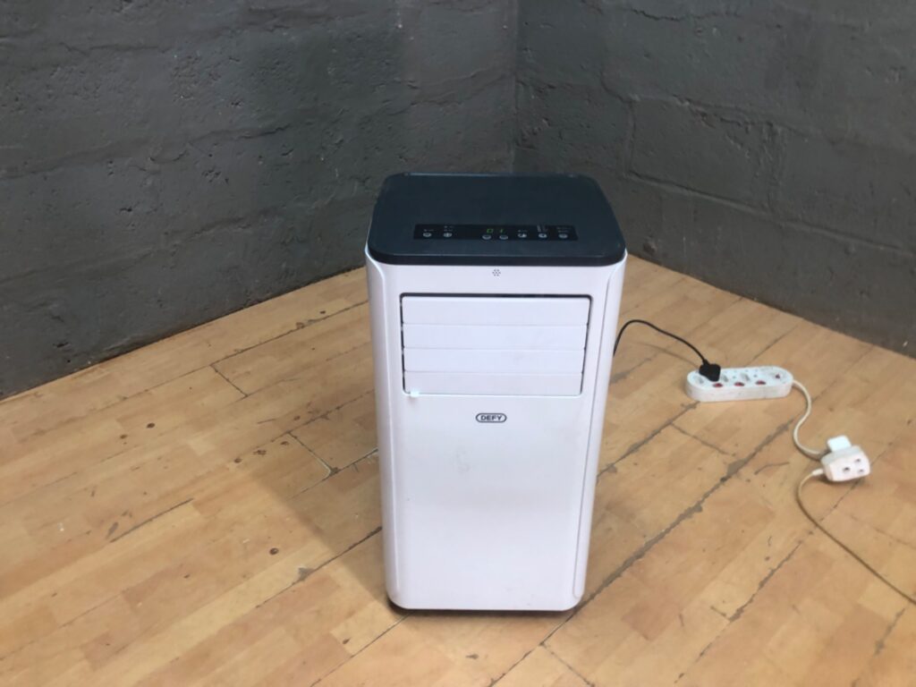 Defy Portable Air Conditioner ACP HP 09K – 2.5 kW / 8530 BTU, Powers On (No Hose / Remote)