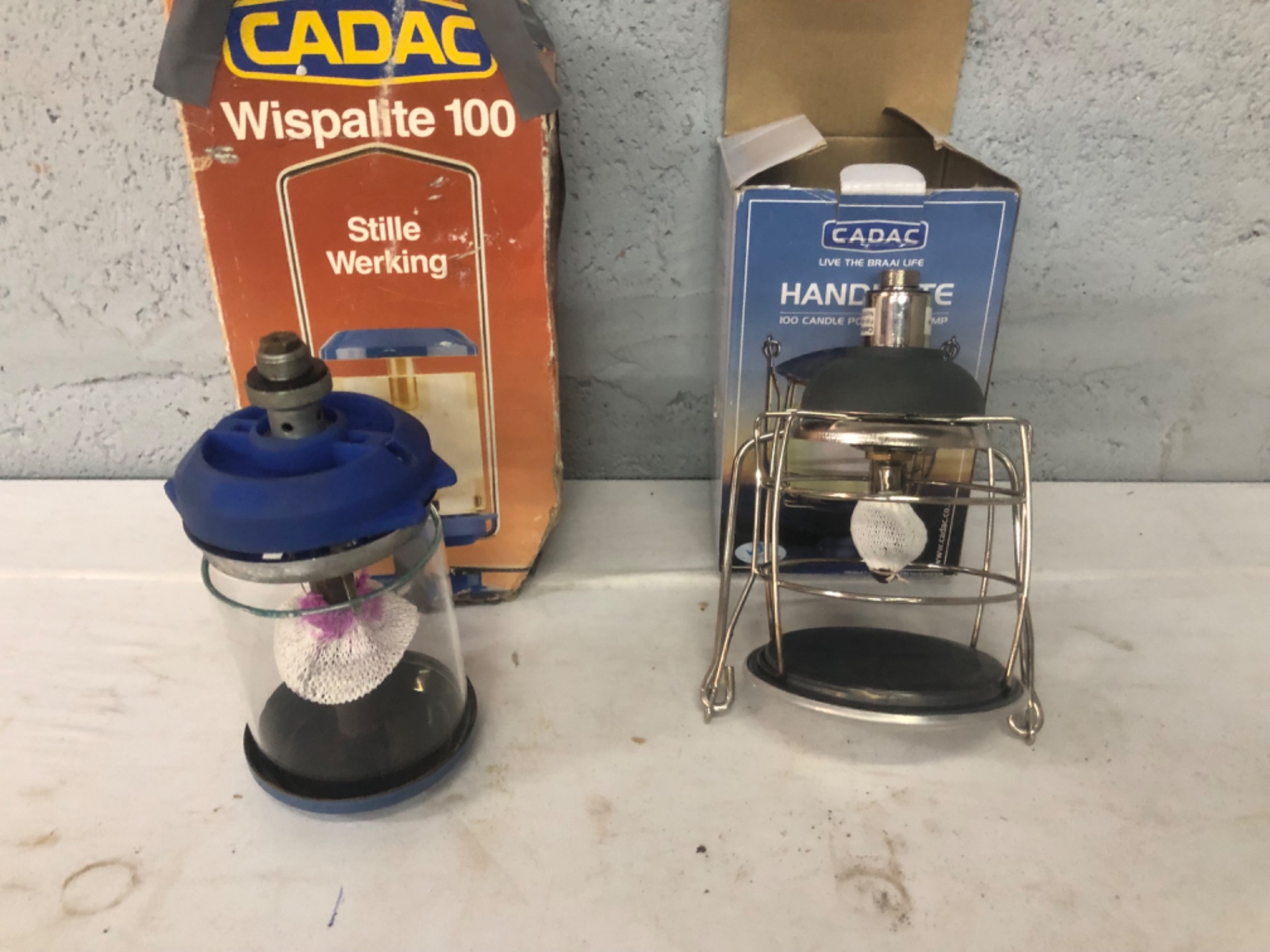 Pair of CADAC camping lamps (Wispalite 100 + Handilite style) with original boxes — mantles & chimneys, working