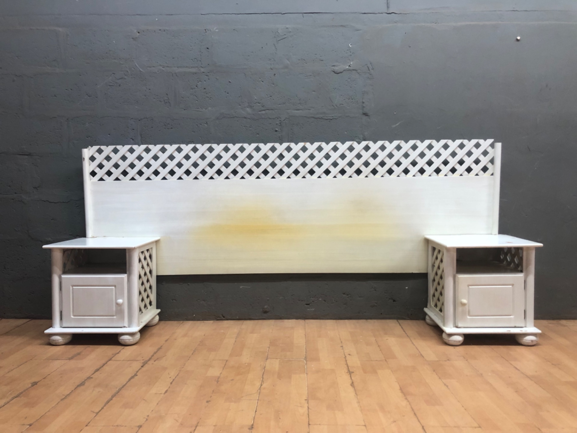 Painted wooden headboard with lattice trim + two matching bedside cabinets — 3-piece set