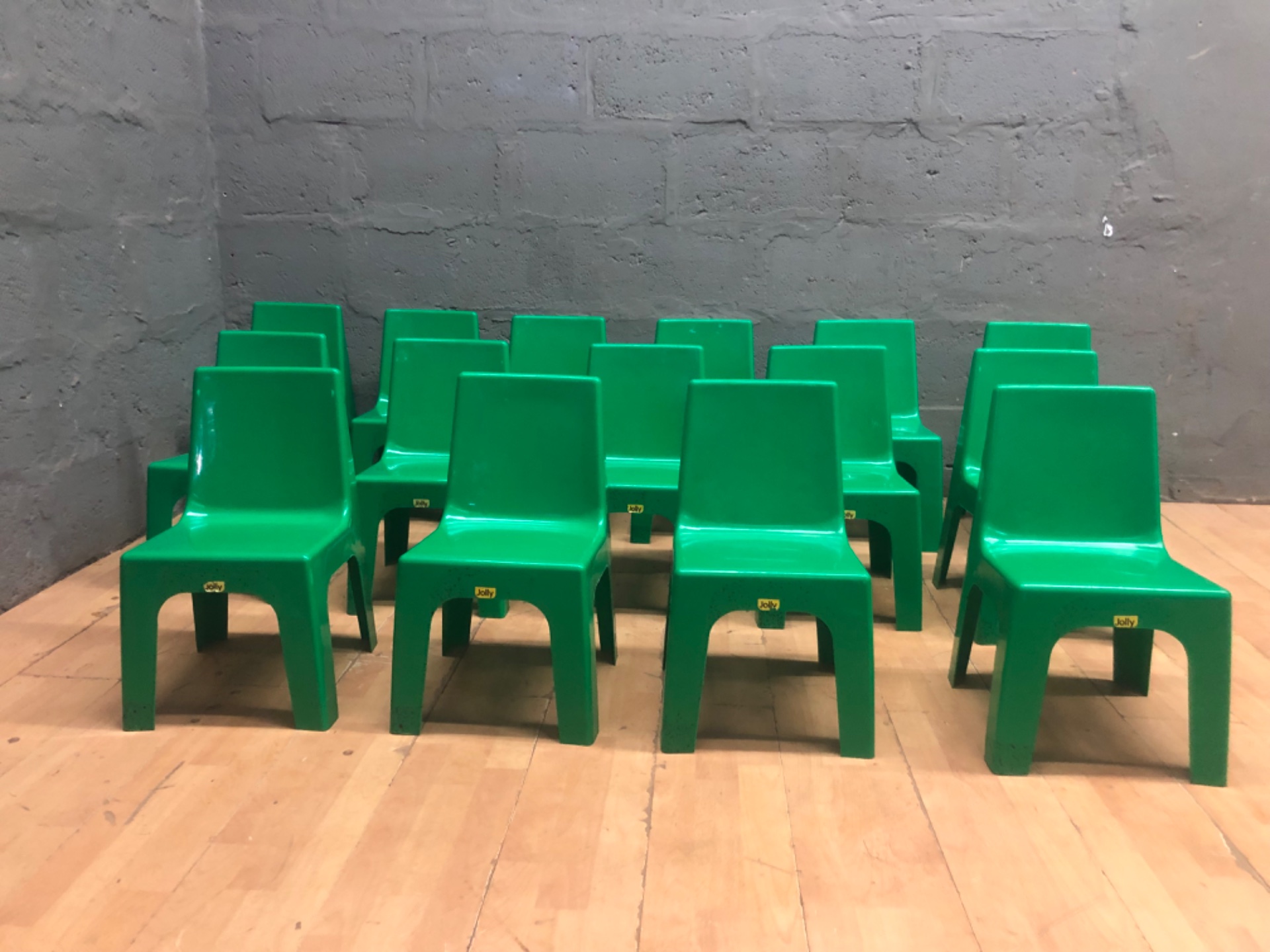 Lot of 15 Green Jolly Moulded Plastic Children’s Chairs — Used, Cosmetic Wear