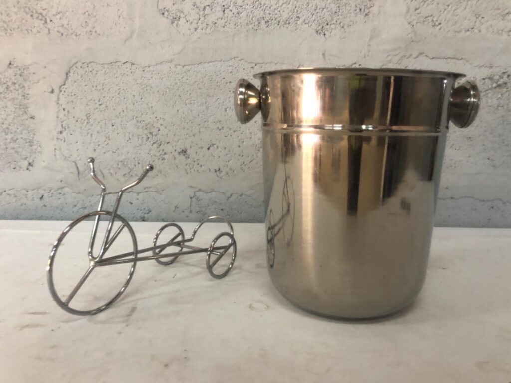 Chrome‑plated metal ice bucket with decorative tricycle bottle/napkin holder