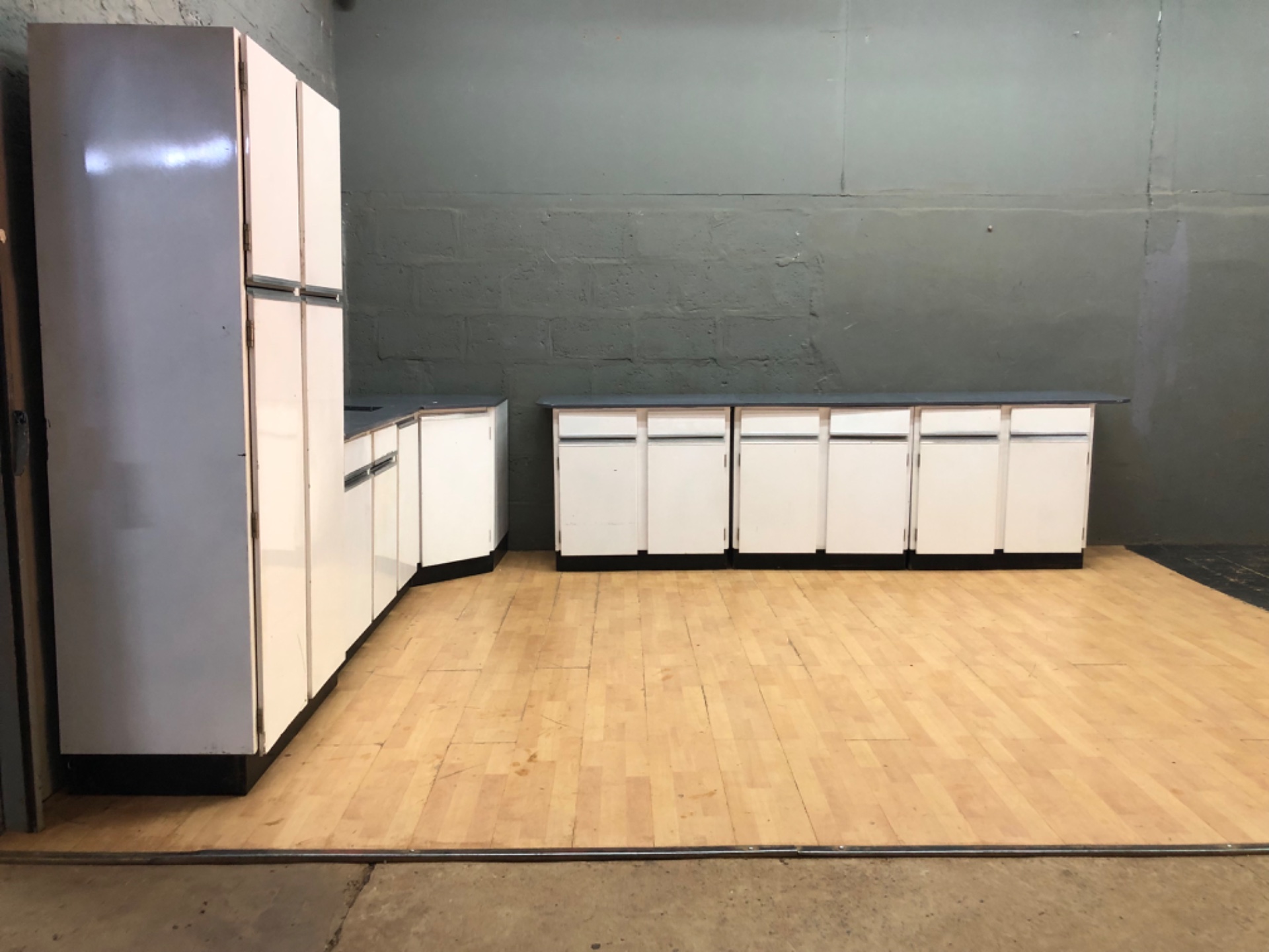 Six-piece white laminate kitchen run with tall pantry + fitted laminate worktops (sink cutout)