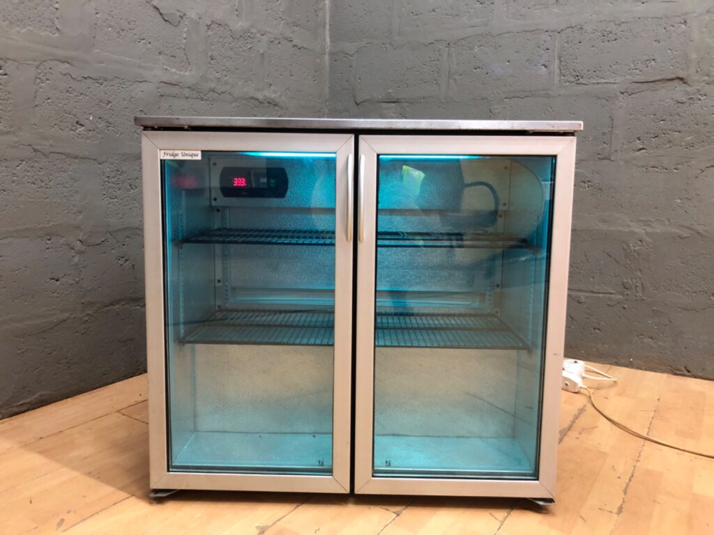 Fridge Unique double-door undercounter display fridge — glass doors, LED lighting, digital thermostat (powers on)