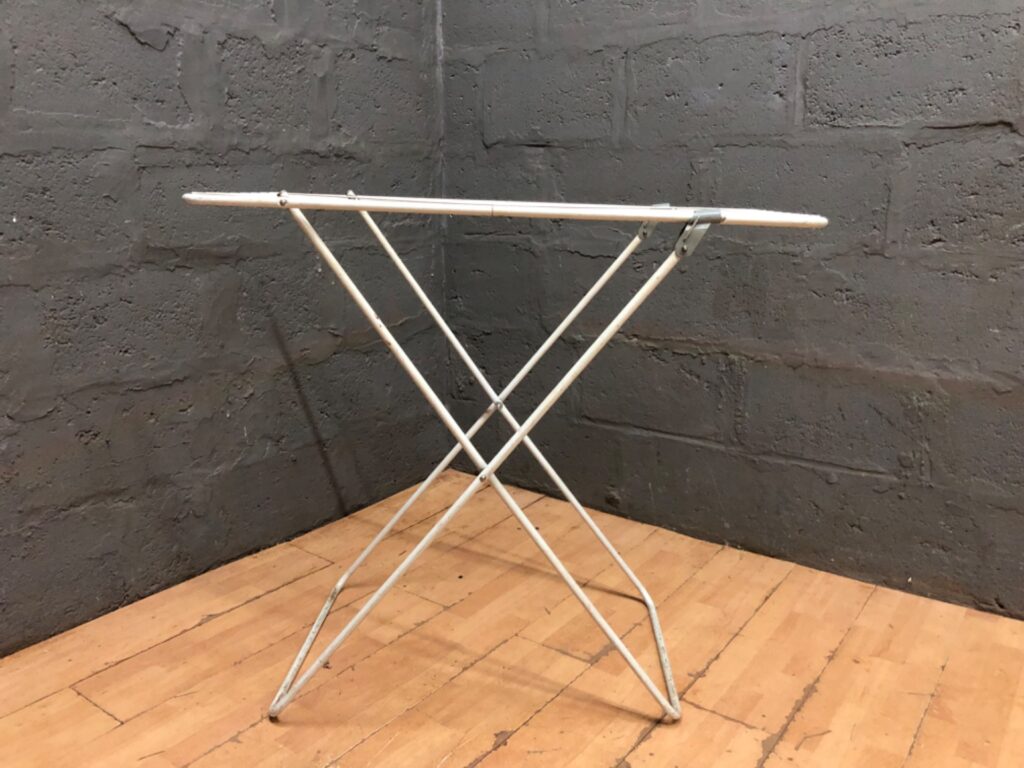 Folding metal clothes drying rack — compact, tested, surface rust