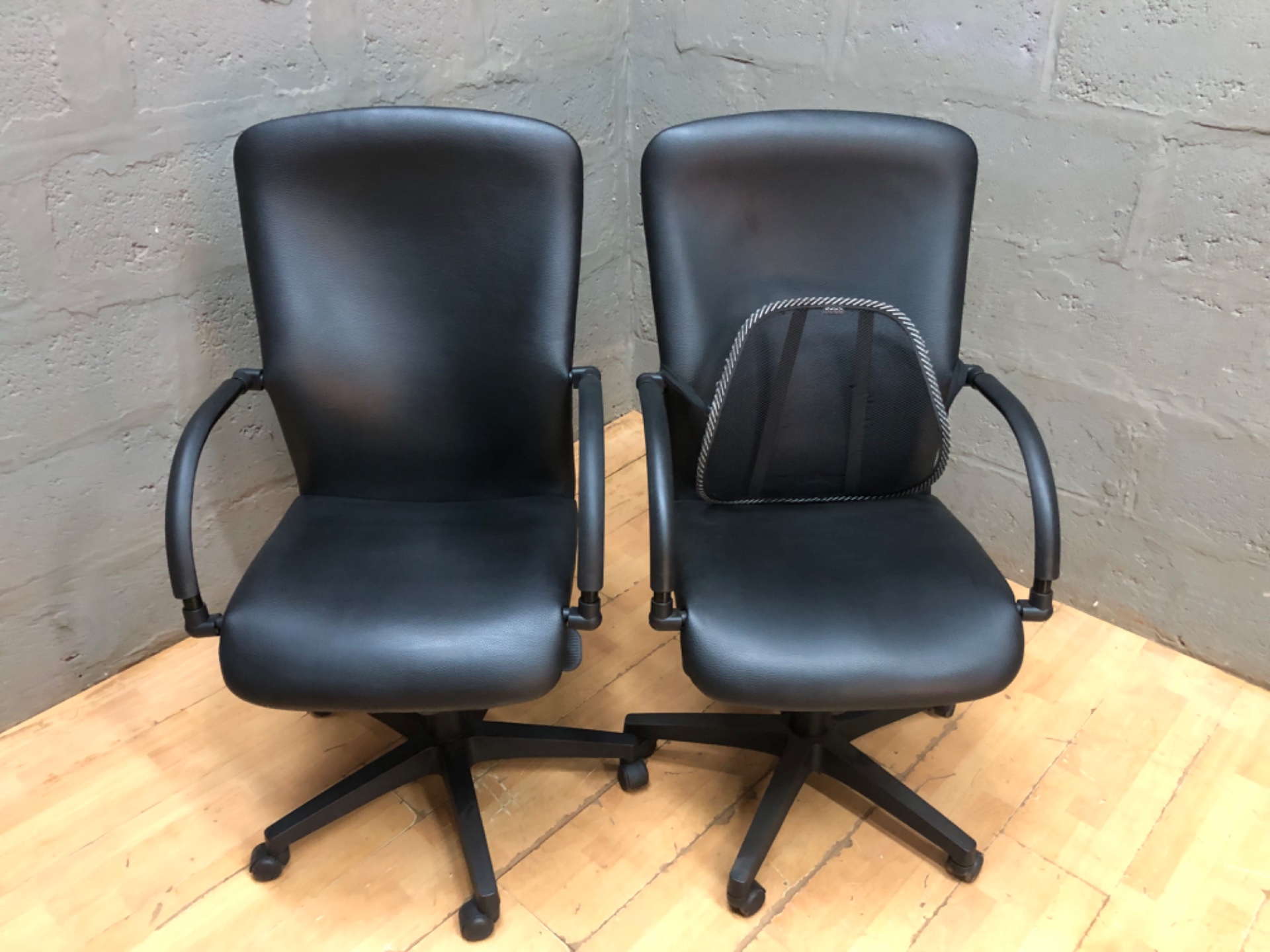 Pair of black office swivel chairs (2) — high back, gas lift, castor bases